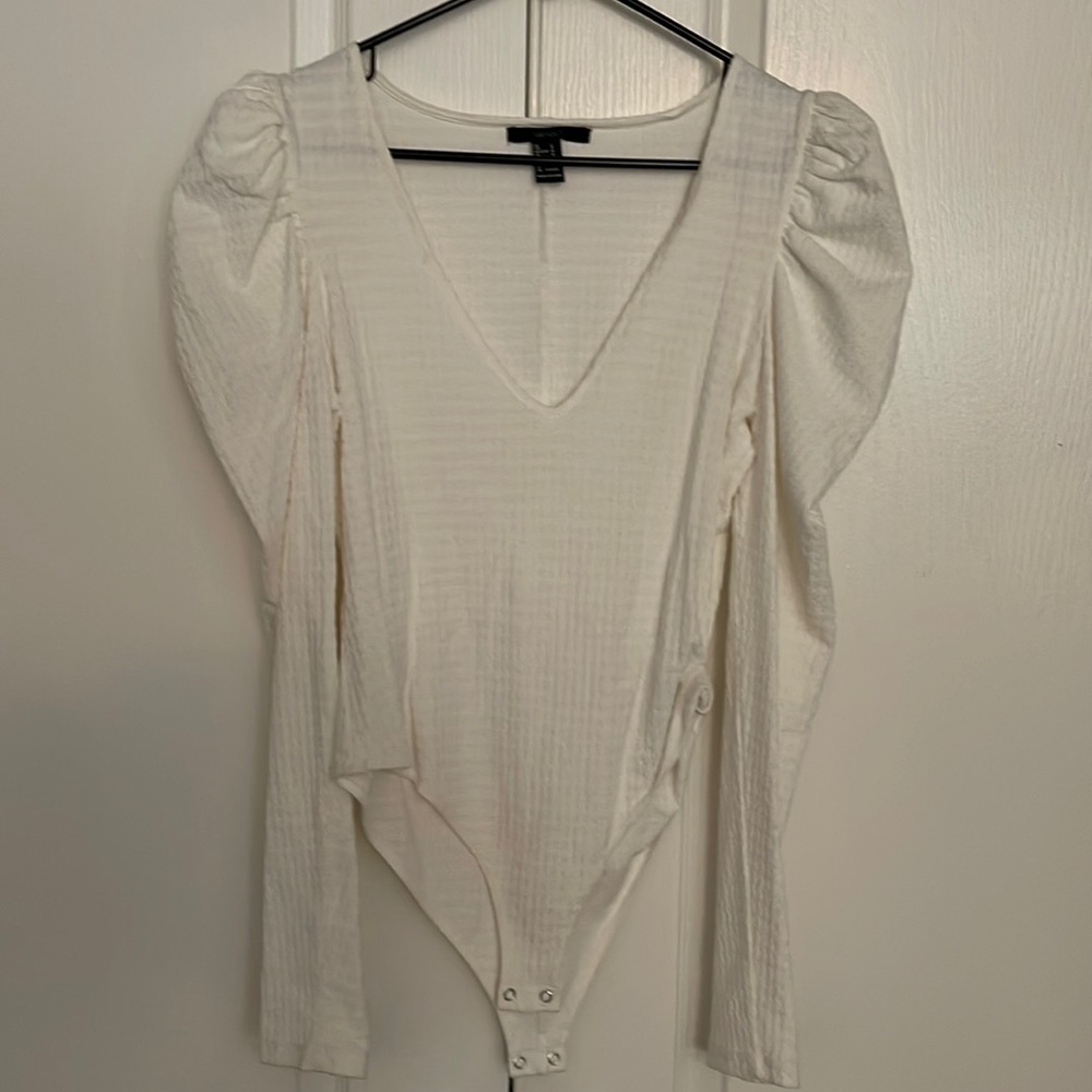 White patterned body suit with puffy shoulders